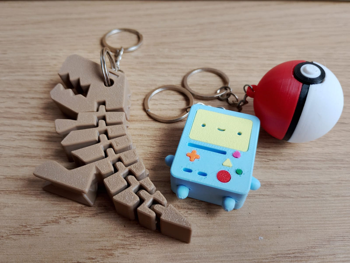 Set of 3 Articulated 3D Dinosaur Keychain Geek Collectible