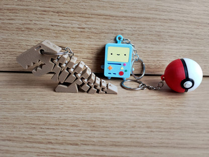 Set of 3 Articulated 3D Dinosaur Keychain Geek Collectible
