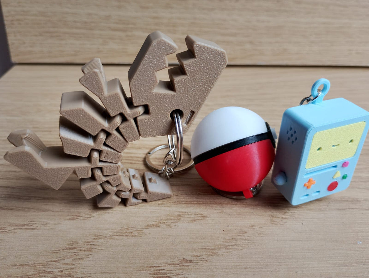 Set of 3 Articulated 3D Dinosaur Keychain Geek Collectible
